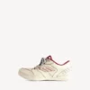 Women’s hamptons medium worn-out sneaker in off white/red