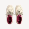 Women’s hamptons medium worn-out sneaker in off white/red